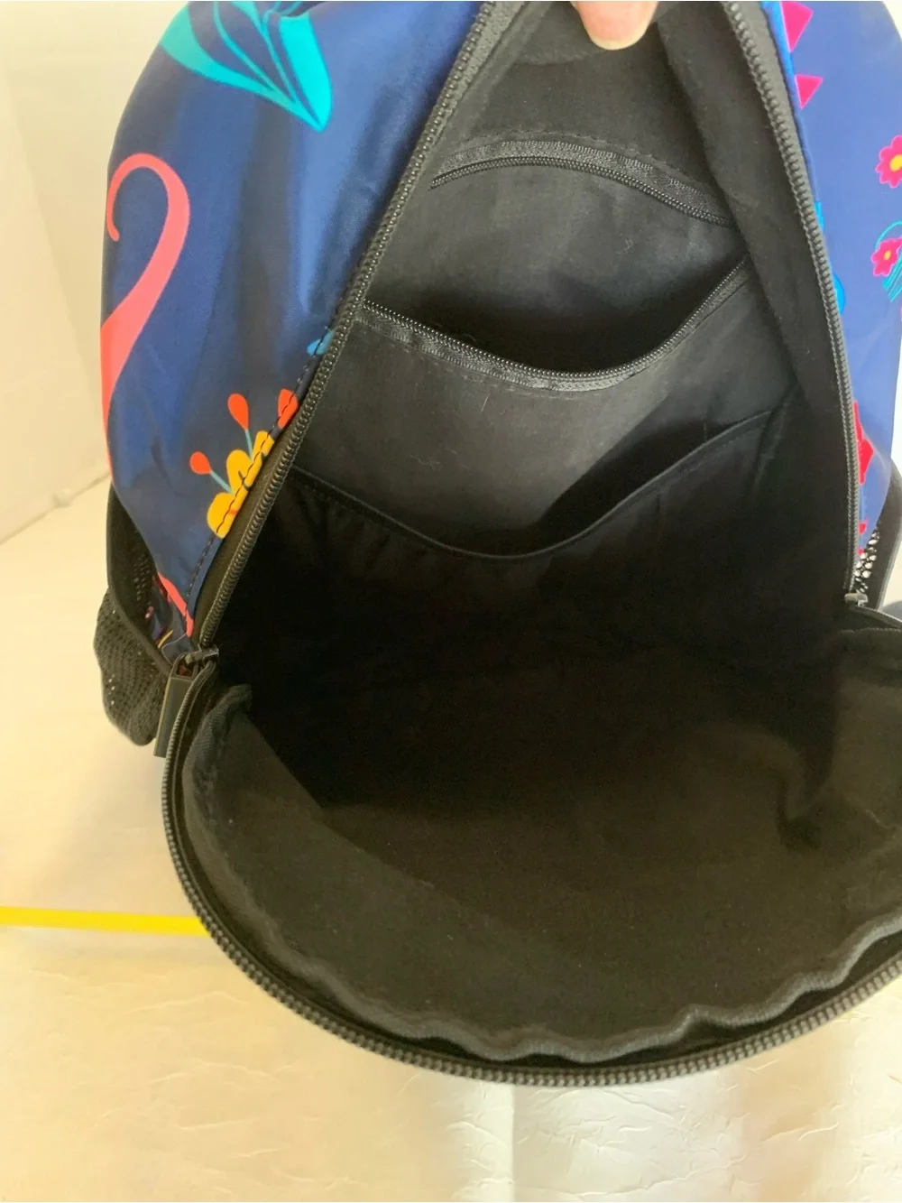 Child’s colorful dinosaur backpack